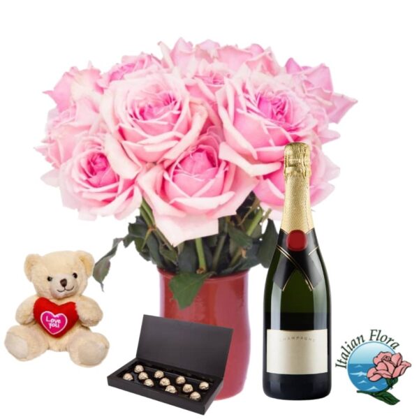 Bouquet de roses roses avec chocolats, nounours et vin rouge